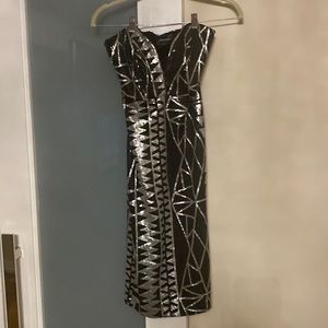 Sexy strapless silver and black sequin fitted dress.